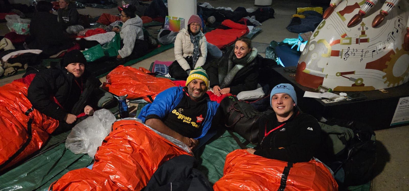 The Anumana team in sleeping bags at the Boycott Your Bed sponsored sleep-out