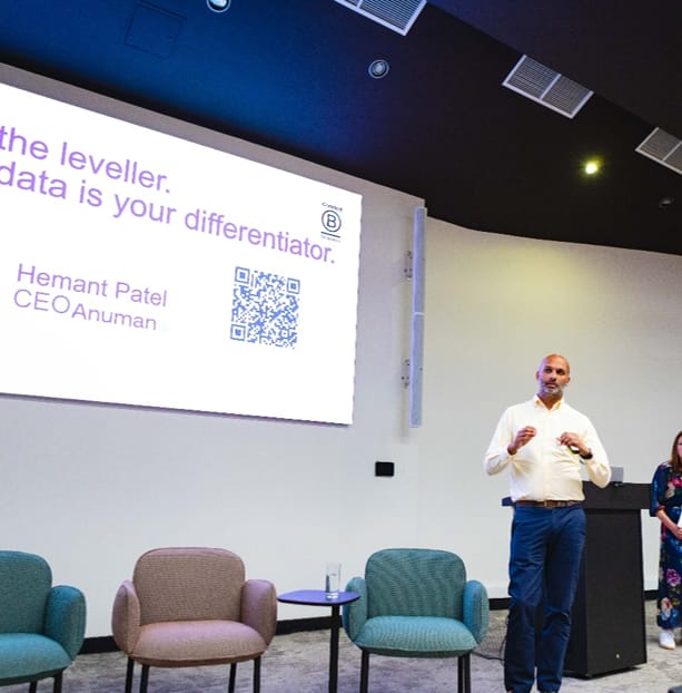 Hemant Patel, CEO of Anumana, speaking at an event about data as a differentiator